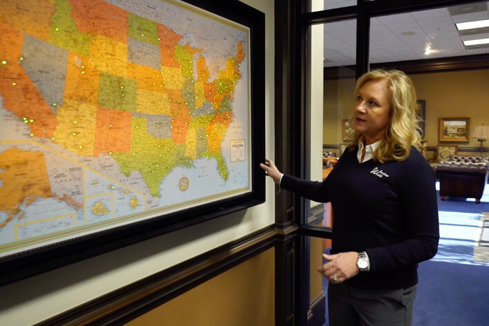 Window World’s CEO looking at a map of all the Window World franchise locations.