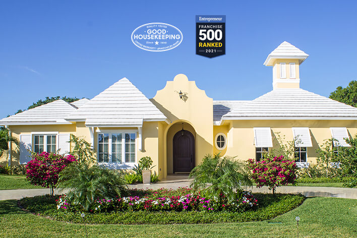 A house and the Good Housekeeping Seal and Franchise 500 badge.